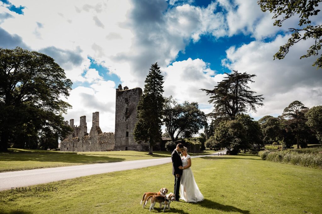 couple with castle backdrop castle martyr