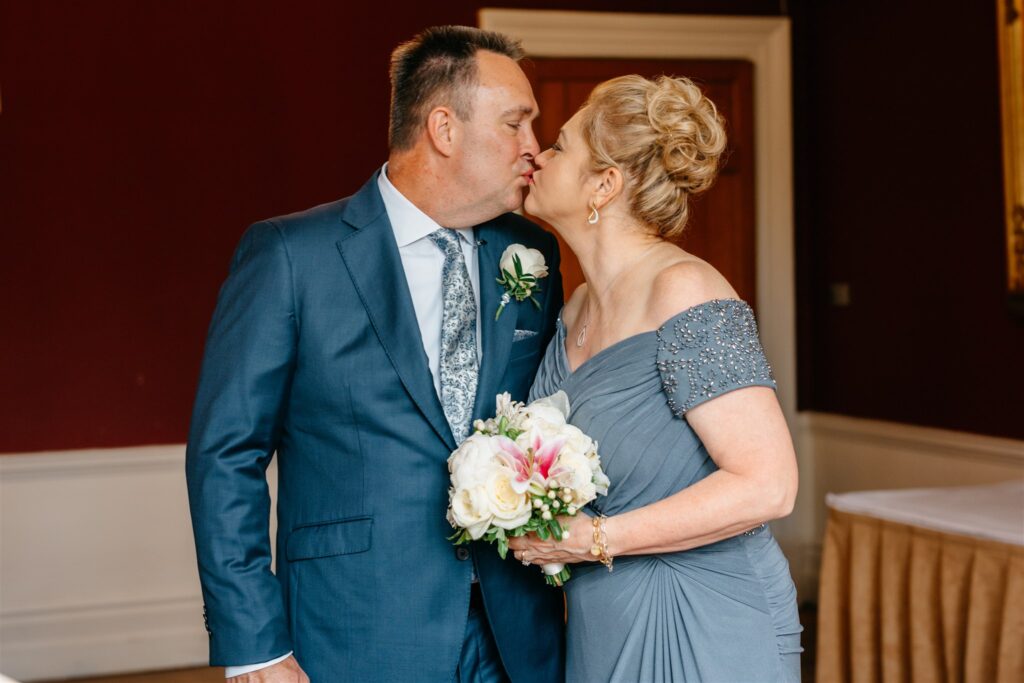 Elope To Ireland elegant wedding at Waterford castle couple kissing Elegant 16th Century Castle